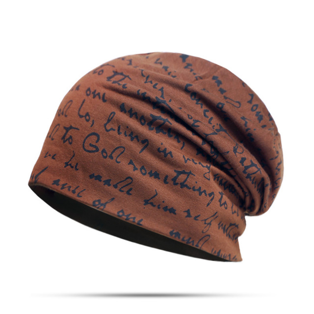 Woman wearing alphabet beanie hat with letter design