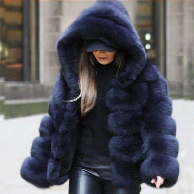Woman wearing short faux fur coat with long sleeves