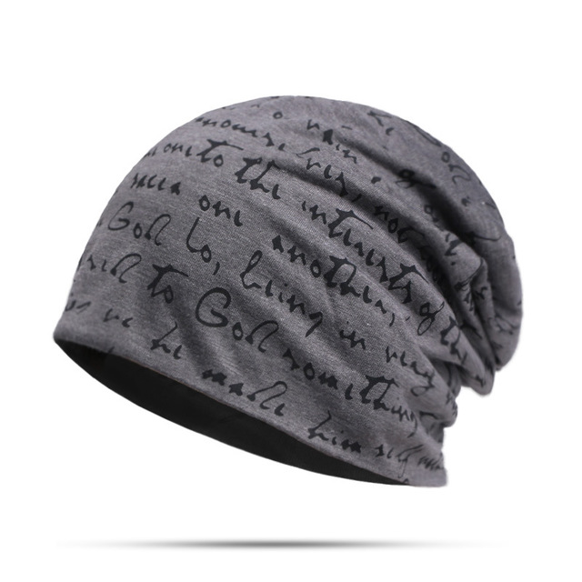Woman wearing alphabet beanie hat with letter design