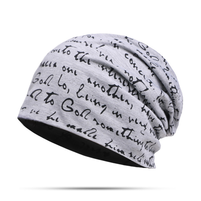 Woman wearing alphabet beanie hat with letter design