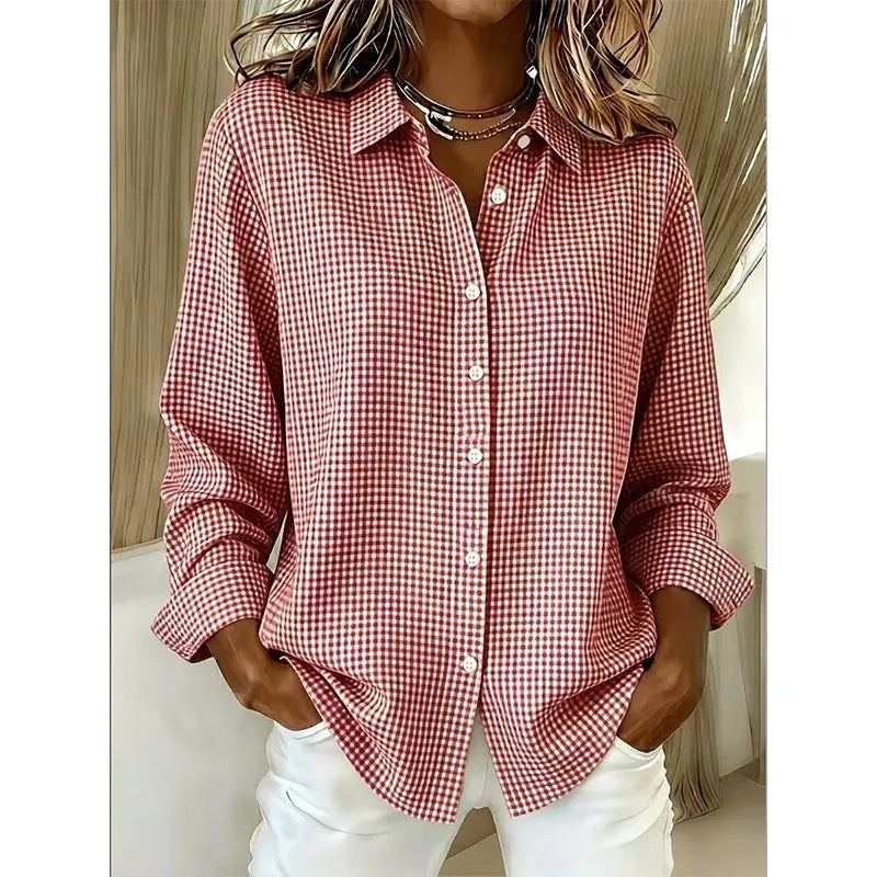 Woman wearing gingham check button-up blouse with long sleeves