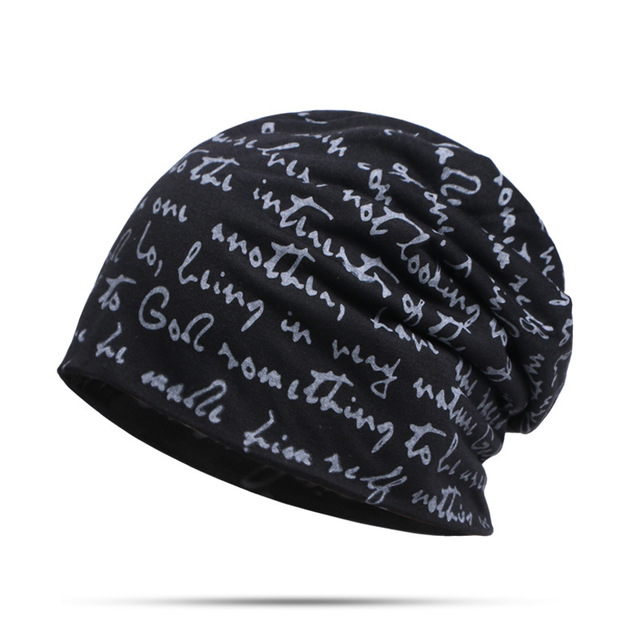 Woman wearing alphabet beanie hat with letter design