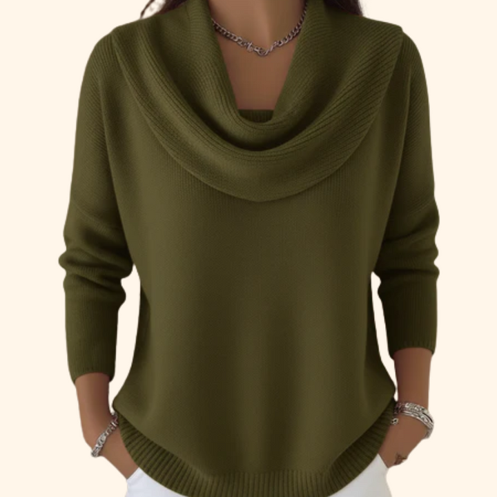 Woman wearing cowl neck knit sweater with relaxed fit