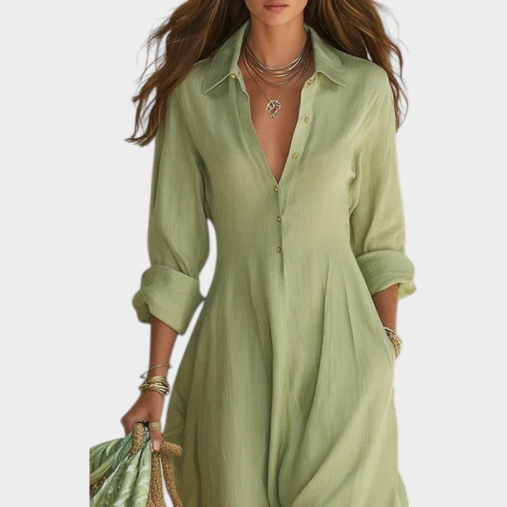 Woman wearing button-front maxi dress with long sleeves