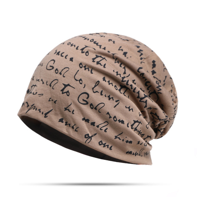 Woman wearing alphabet beanie hat with letter design
