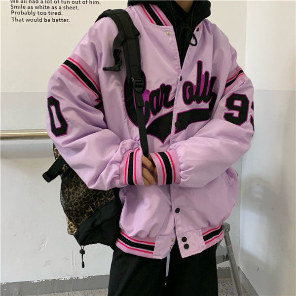 Woman wearing loose hip hop jacket with letter print
