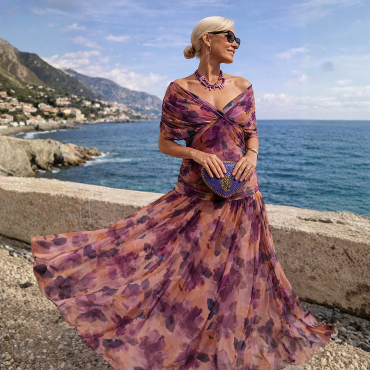 Woman wearing V-neck maxi dress with flowy skirt