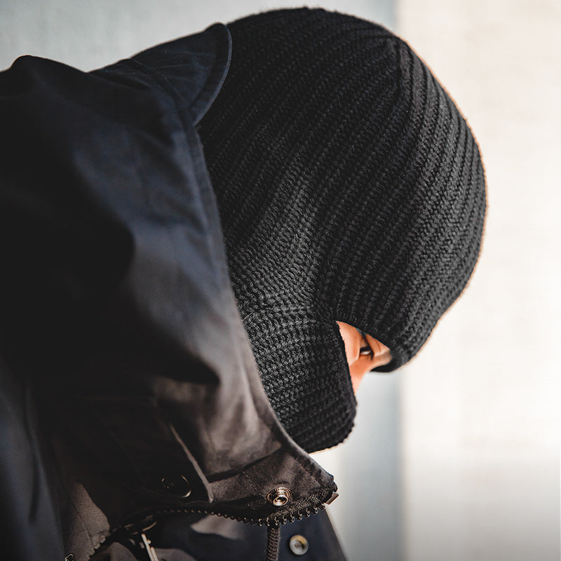 Black knitted beanie with vintage melon skin pattern