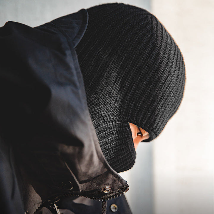 Black knitted beanie with vintage melon skin pattern