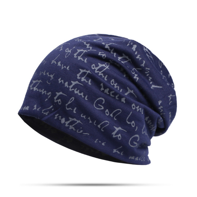 Woman wearing alphabet beanie hat with letter design