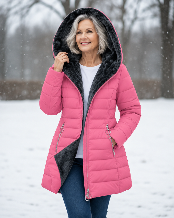 Woman wearing quilted winter coat with hood outdoors