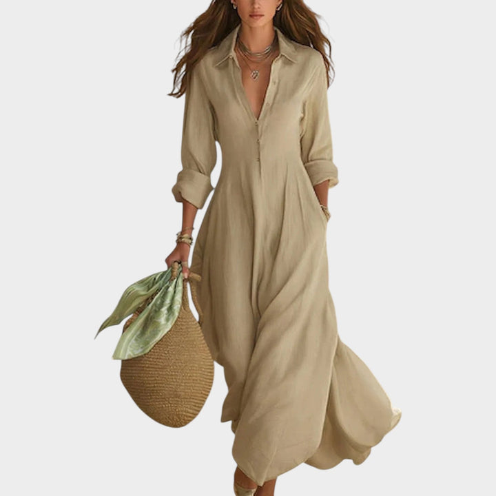 Woman wearing button-front maxi dress with long sleeves