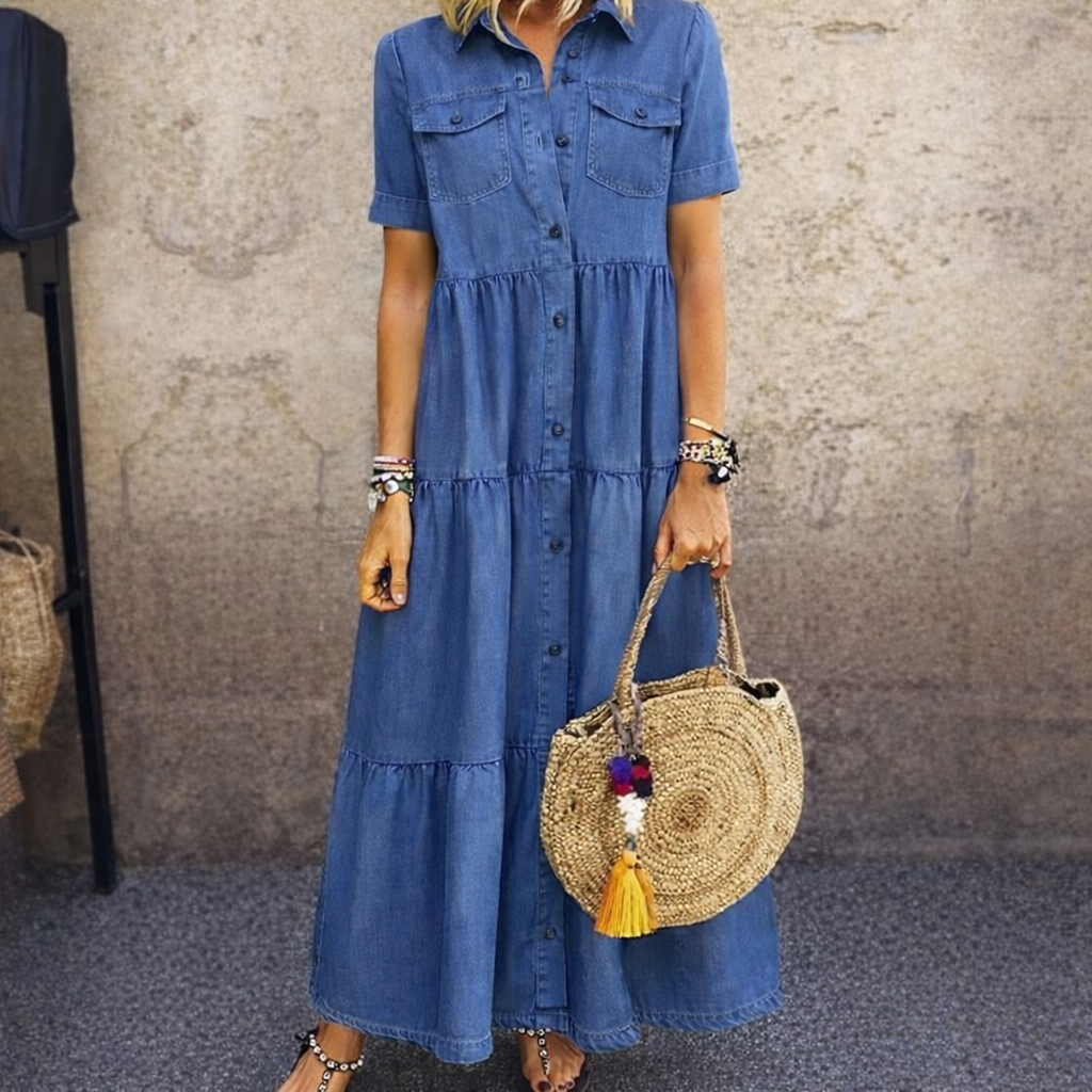 Woman wearing button-front midi dress with tiered skirt