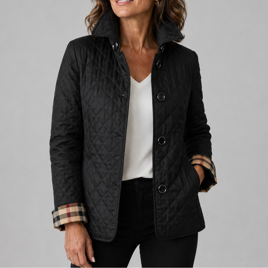 Woman wearing a quilted button front jacket with stand collar