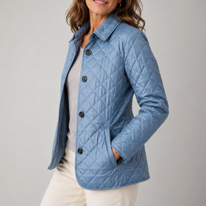 Woman wearing a quilted button front jacket with stand collar