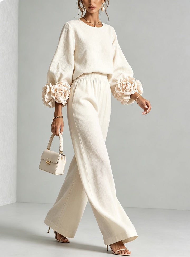 Woman wearing floral two-piece set with wide-leg pants