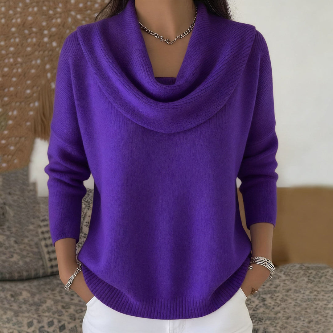 Woman wearing relaxed cowl neck knit sweater