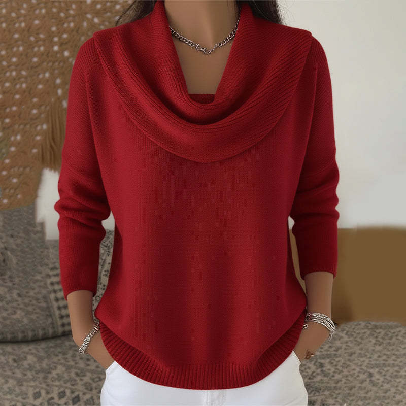 Woman wearing cowl neck knit sweater with relaxed fit