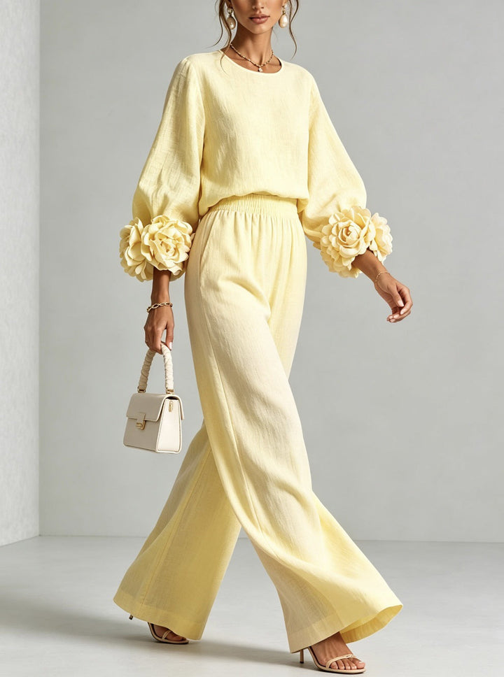 Woman wearing floral two-piece set with wide-leg pants