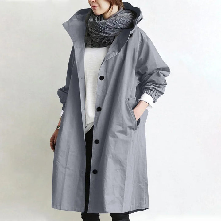 Woman in hooded longline relaxed trench coat