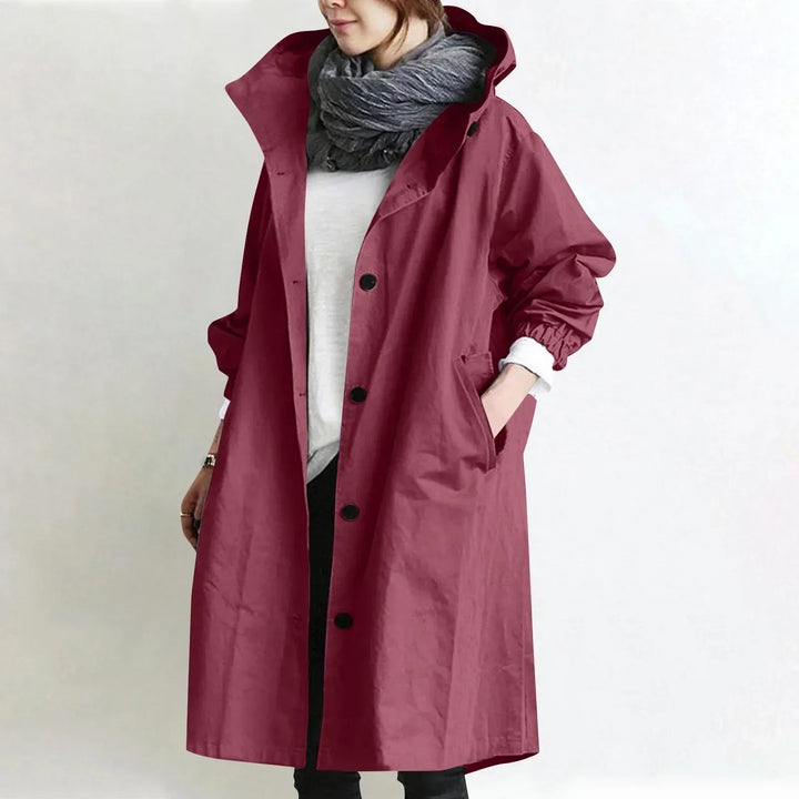 Woman in hooded longline relaxed trench coat