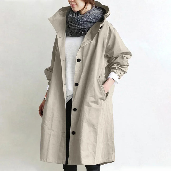 Woman in hooded longline relaxed trench coat
