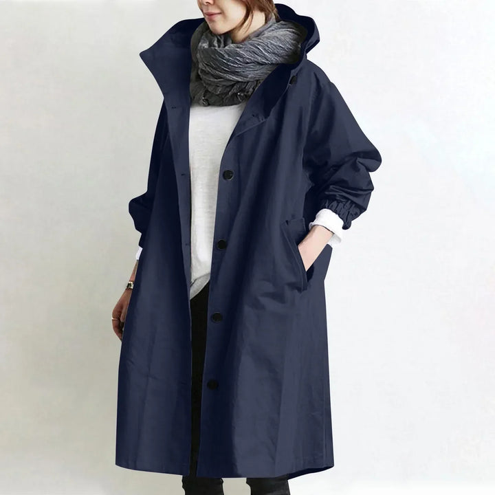Woman in hooded longline relaxed trench coat