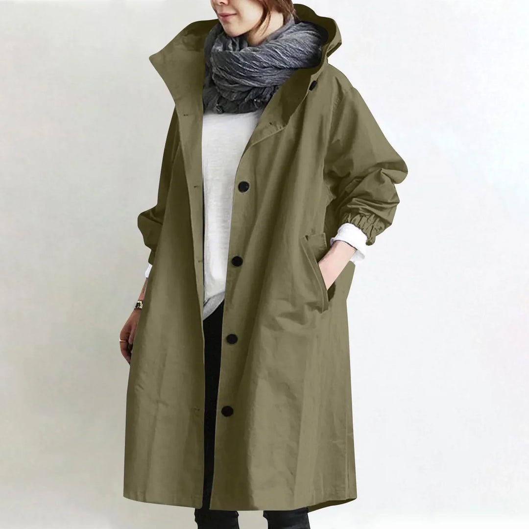 Woman in hooded longline relaxed trench coat