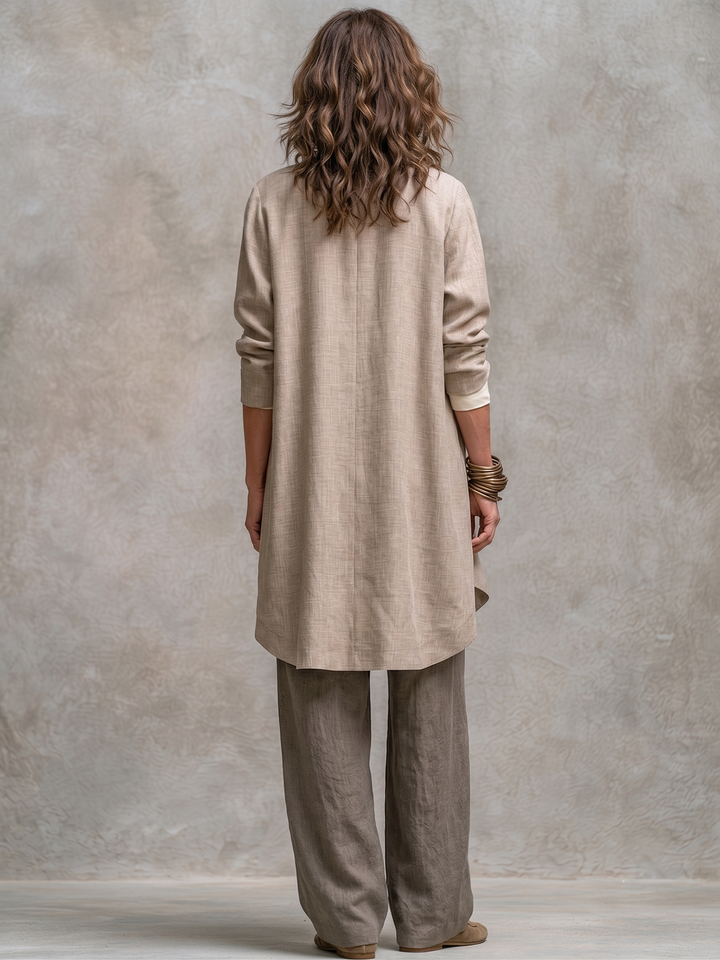 Woman wearing taupe three-piece wide leg pant set outdoors