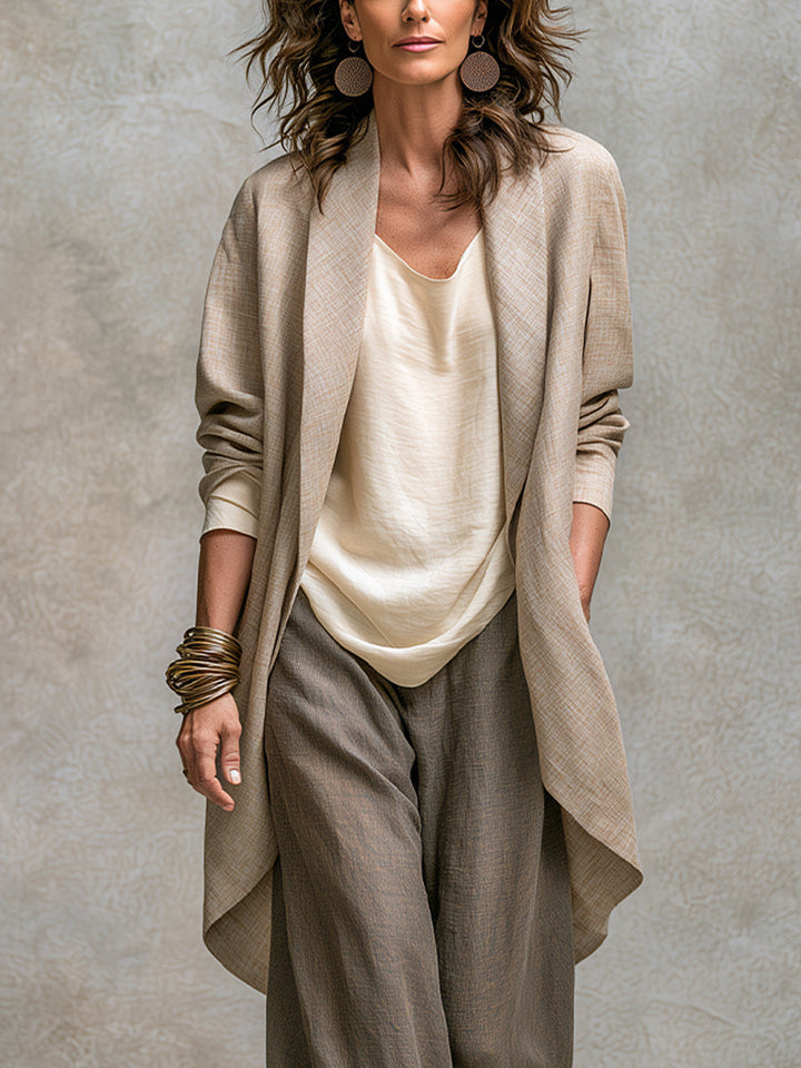 Woman wearing taupe three-piece wide leg pant set outdoors