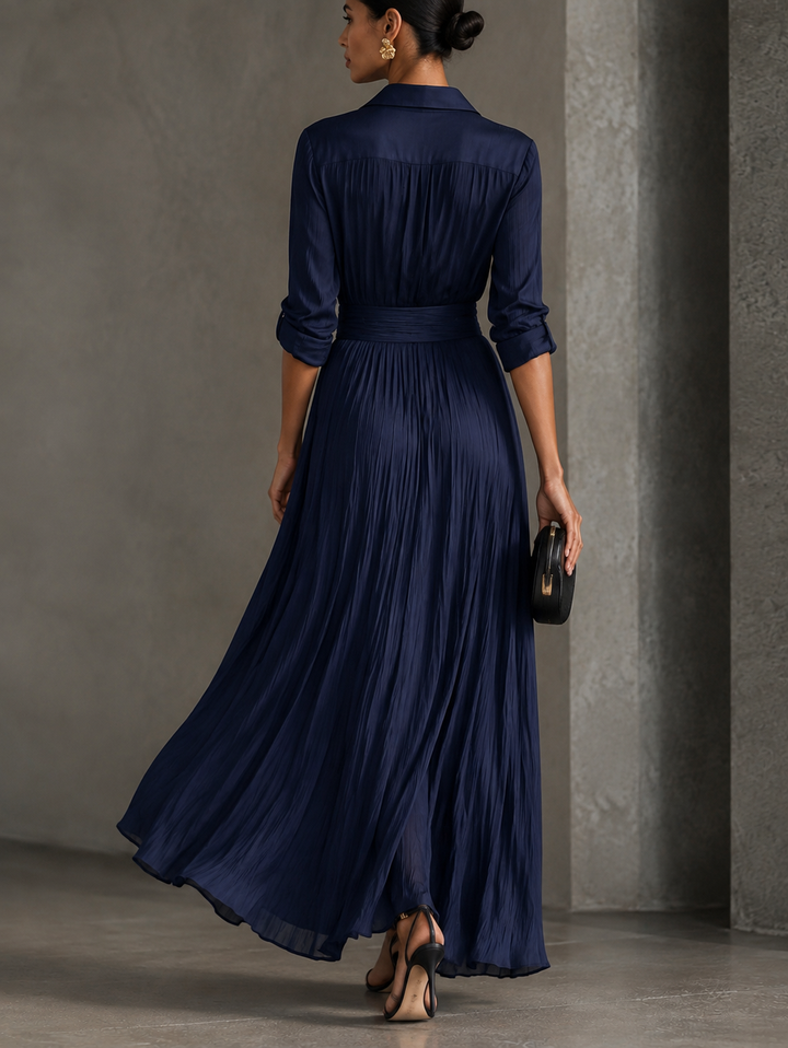 Woman wearing navy V-neck knotted maxi dress with side slit