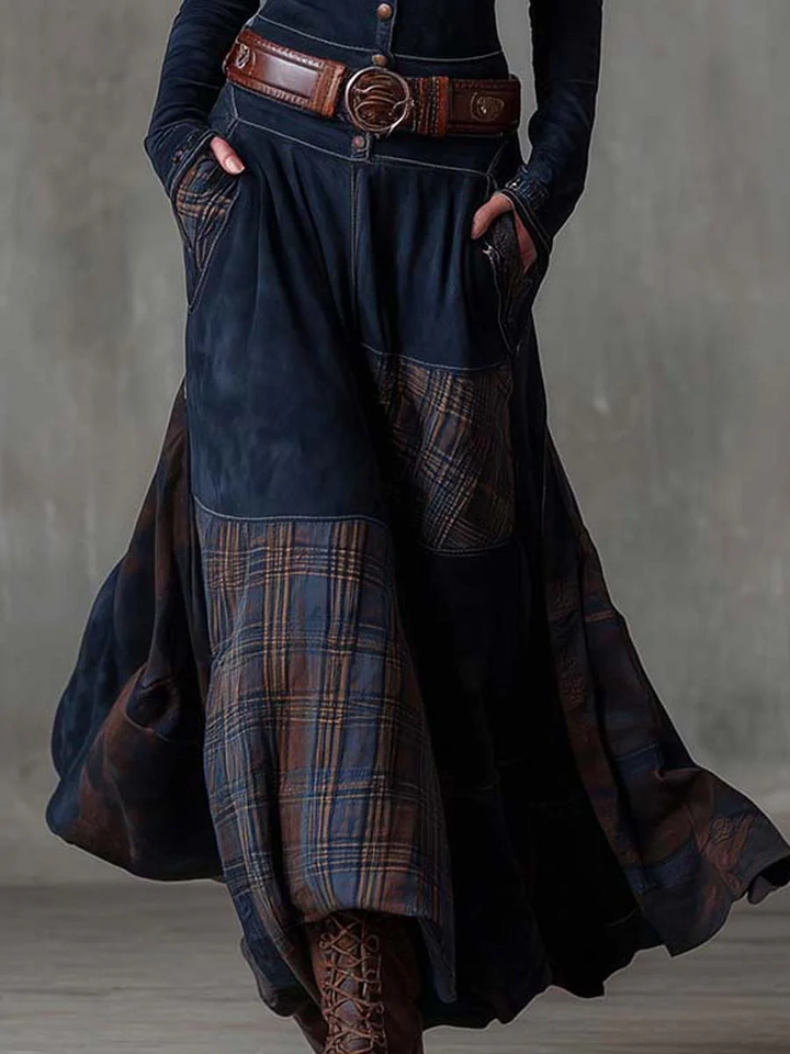 Woman wearing patchwork maxi dress with button front and belt