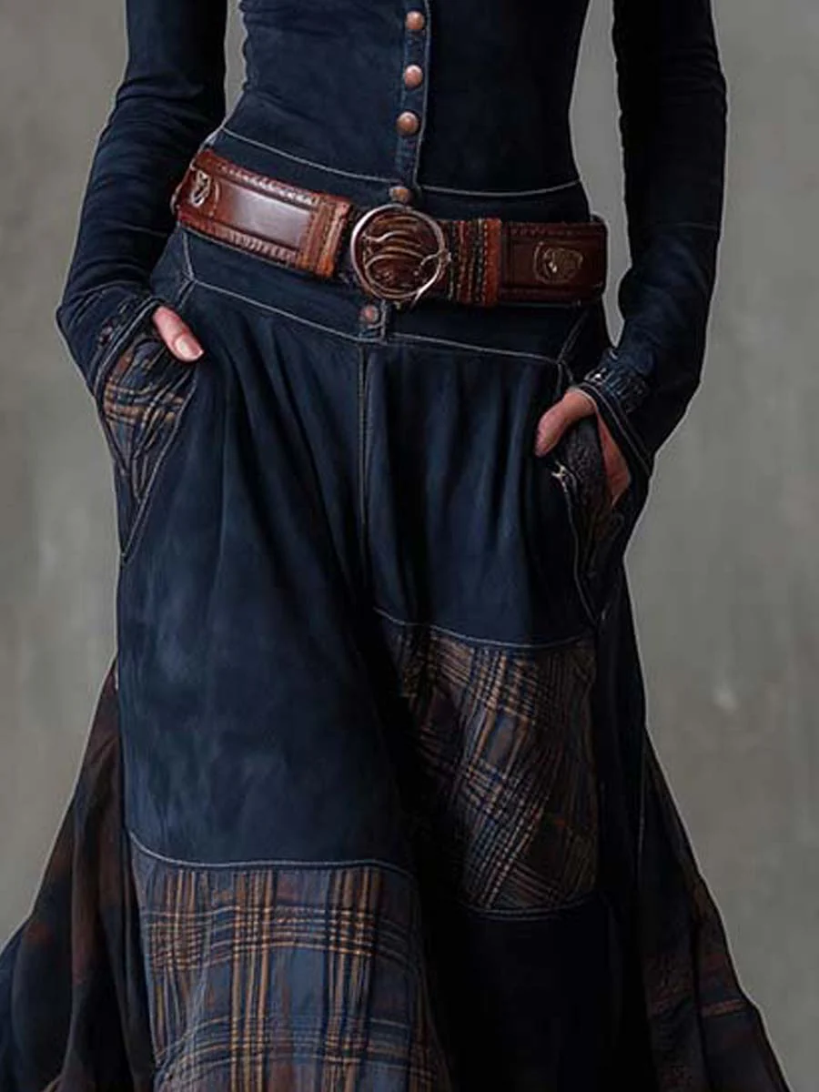 Woman wearing patchwork maxi dress with button front and belt