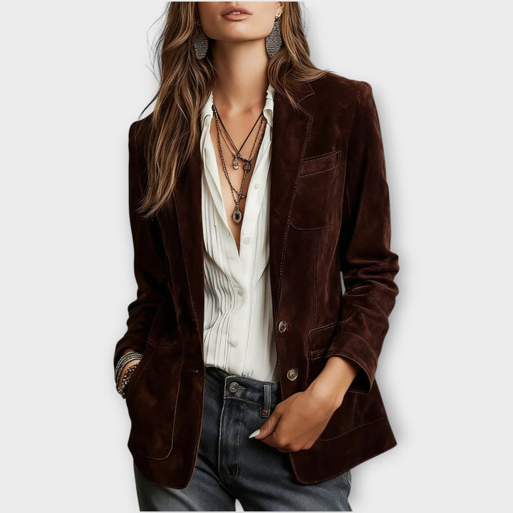 Woman wearing brown structured blazer with front buttons