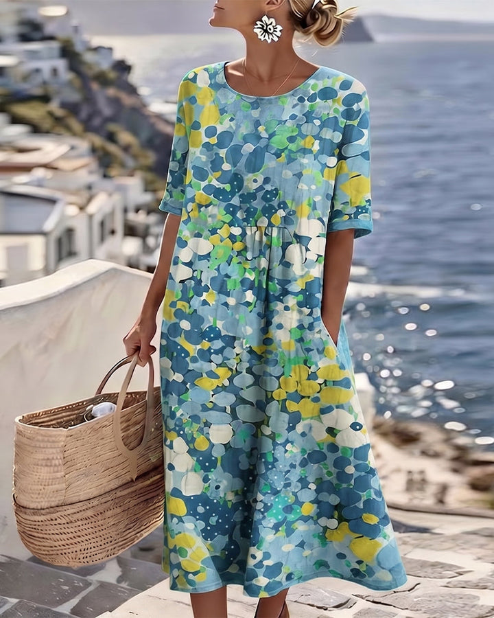 Woman wearing abstract floral print midi dress with short sleeves