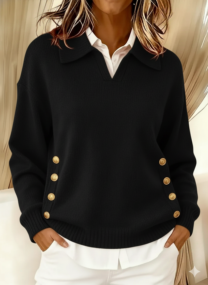 Woman wearing V-neck sweater with collar and gold buttons