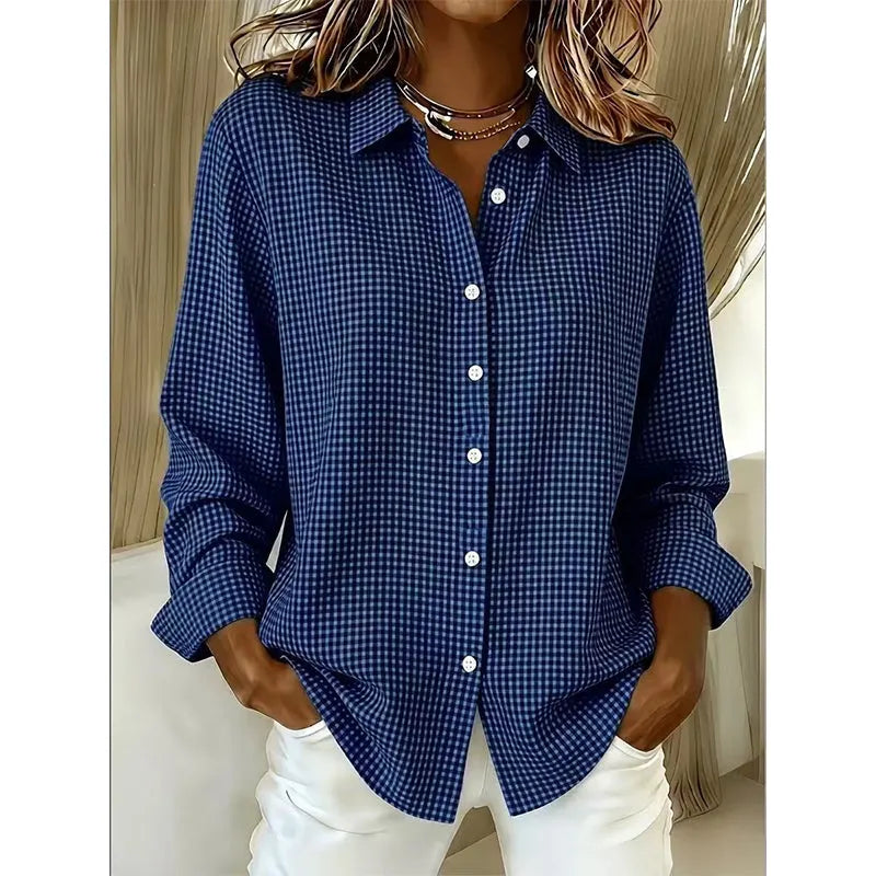 Woman wearing gingham check button-up blouse with long sleeves