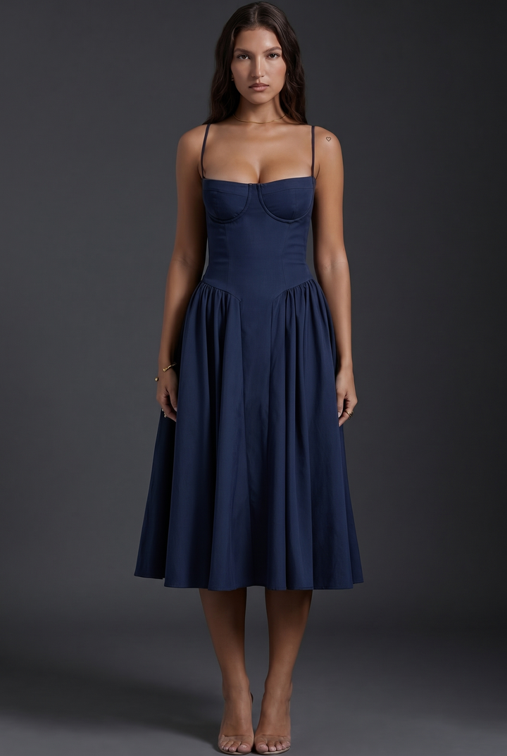 Woman wearing structured bodice midi dress flared skirt