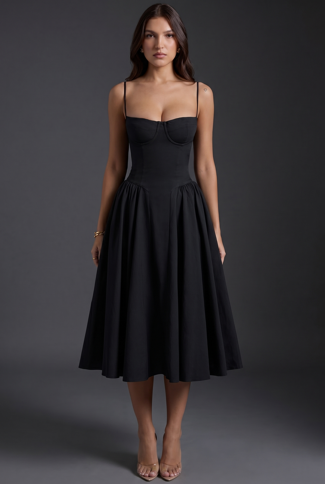 Woman wearing structured bodice midi dress flared skirt