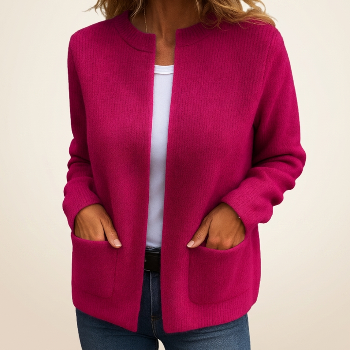 Woman wearing ribbed open front cardigan with pockets