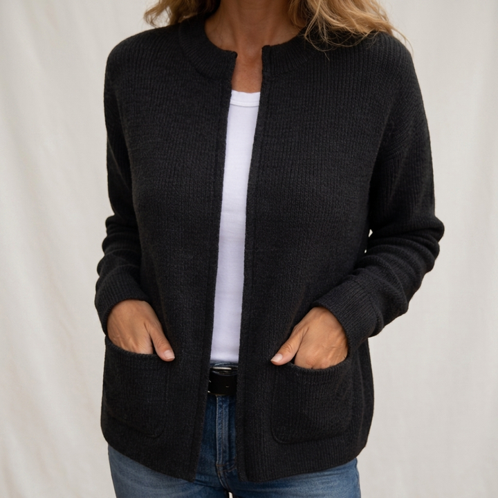 Woman wearing ribbed open front cardigan with pockets