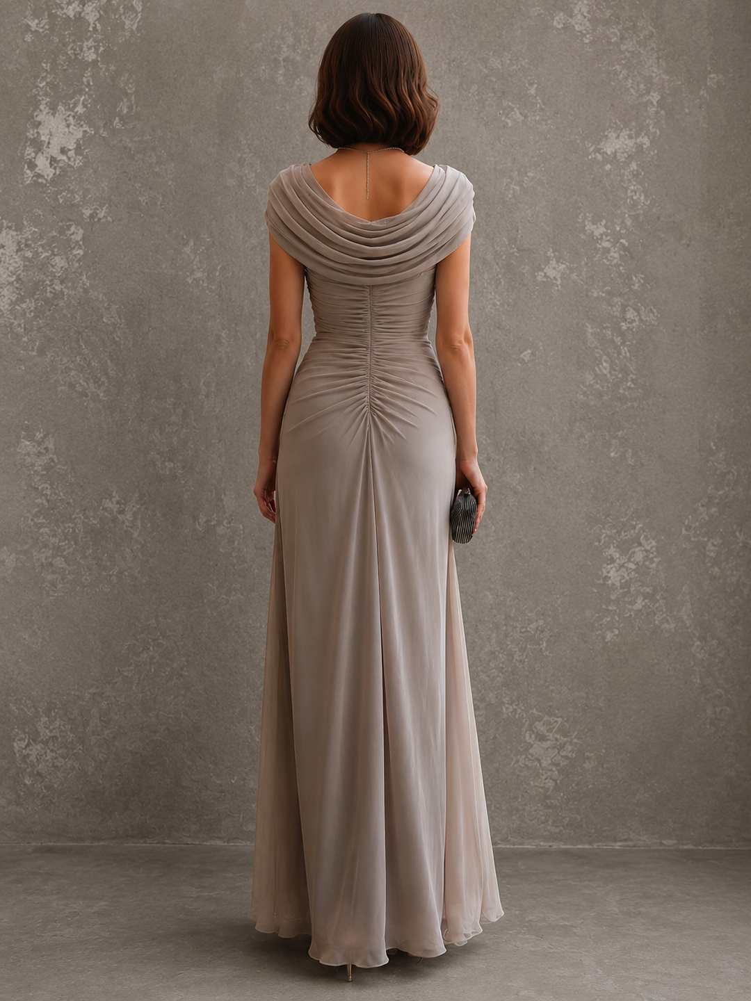 Woman wearing draped sleeveless maxi dress outdoors