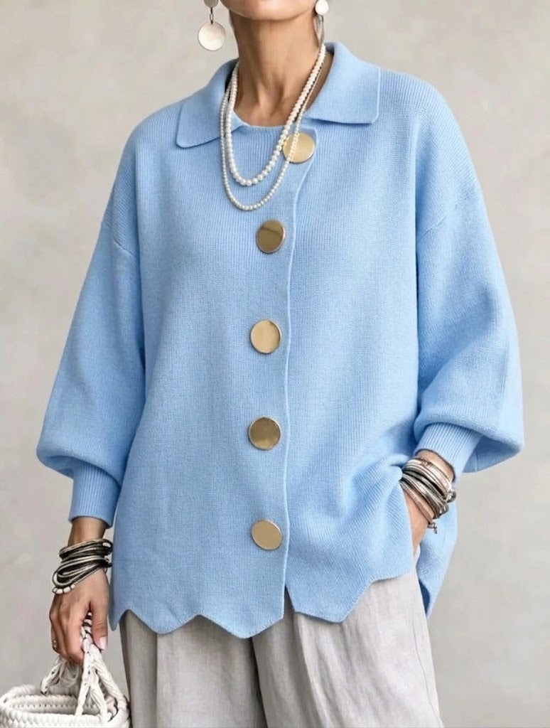 Woman wearing oversized cardigan with lantern sleeves