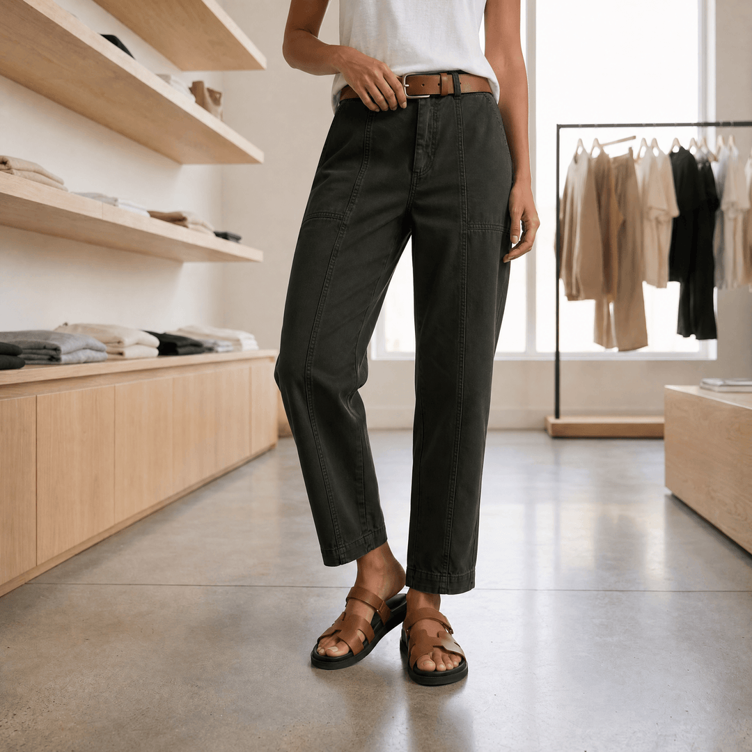 Woman wearing high waist tailored utility pants with pockets