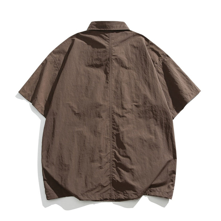 Men's Short Sleeve Collared Shirt with Four Zip Pockets and Drawstring Hem