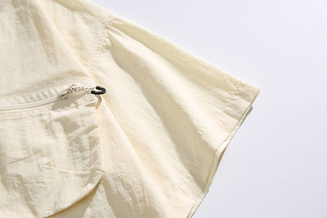 Men's Short Sleeve Collared Shirt with Four Zip Pockets and Drawstring Hem