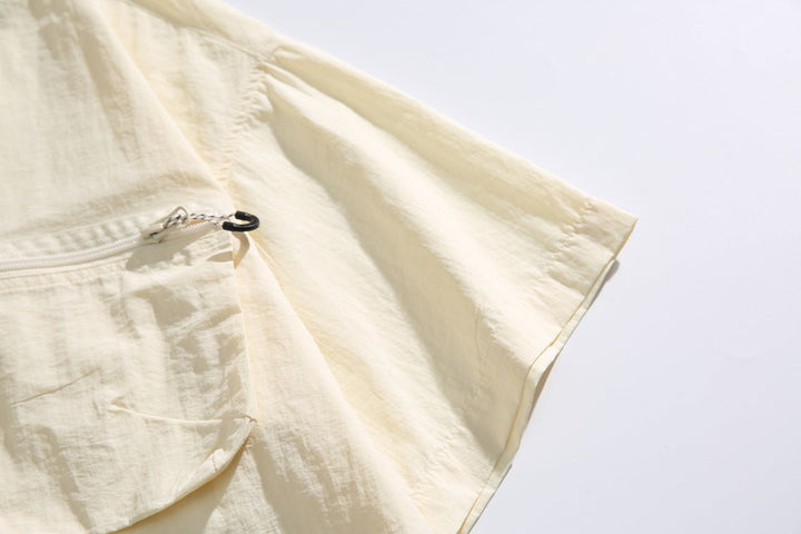Men's Short Sleeve Collared Shirt with Four Zip Pockets and Drawstring Hem