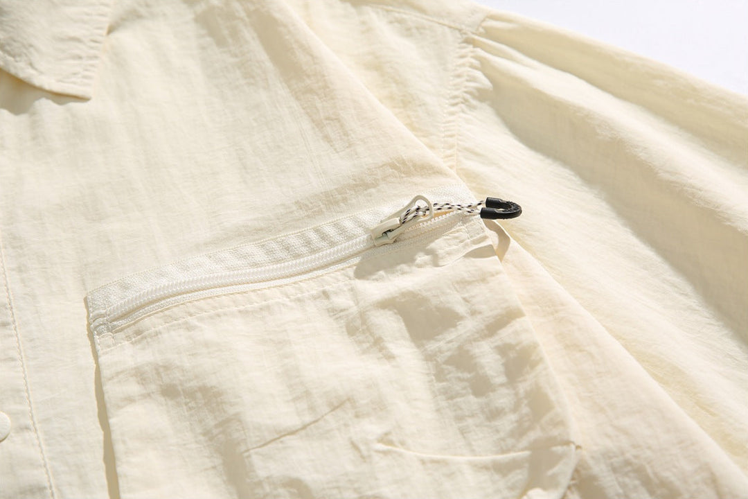 Men's Short Sleeve Collared Shirt with Four Zip Pockets and Drawstring Hem