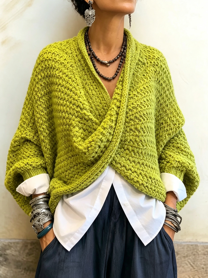 Woman wearing crossover V-neck batwing sleeve sweater