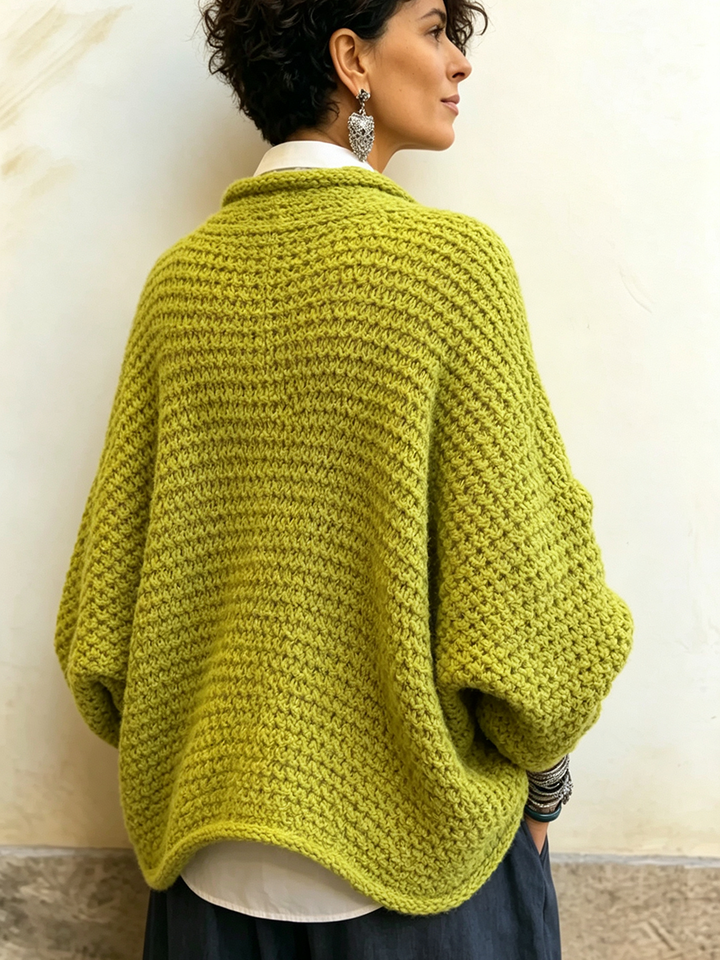Woman wearing crossover V-neck batwing sleeve sweater